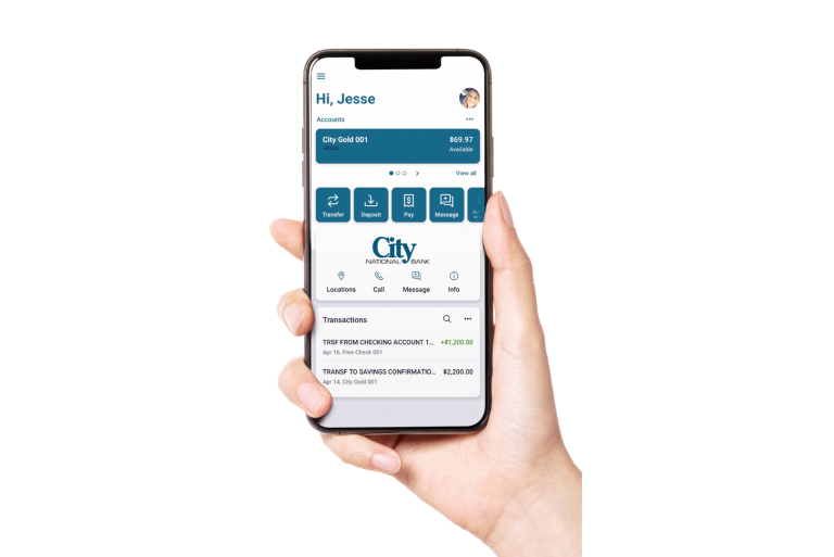 Hand holding a device with the City National Bank mobile app on it